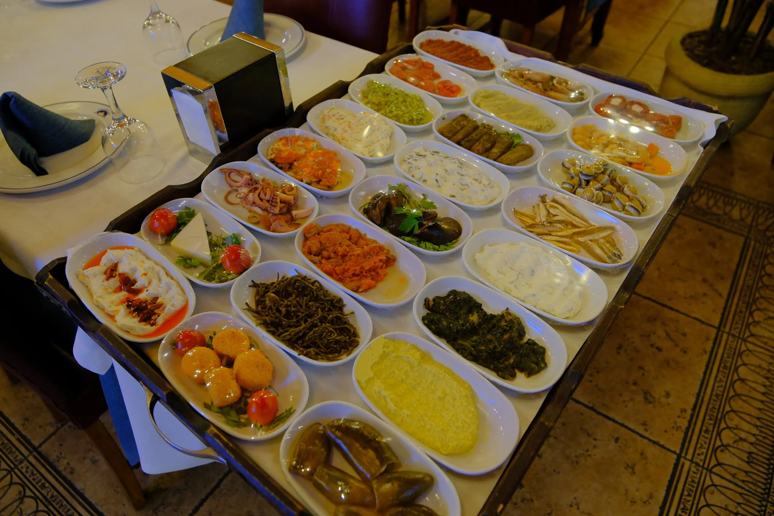A tray of assorted cold meze brought to the table